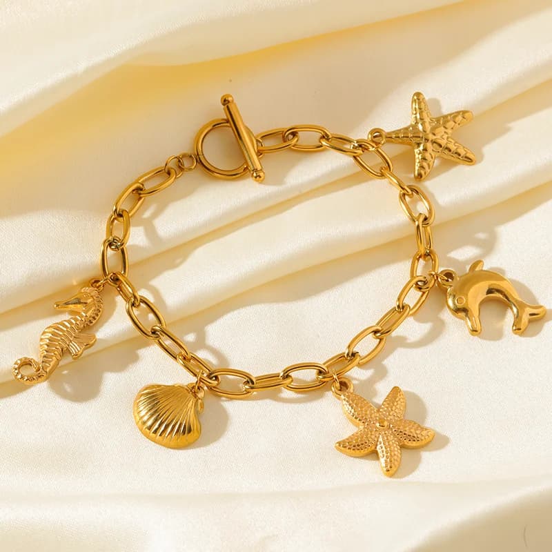 Gelang Charm Matahari Bulan Bintang Laut Emas